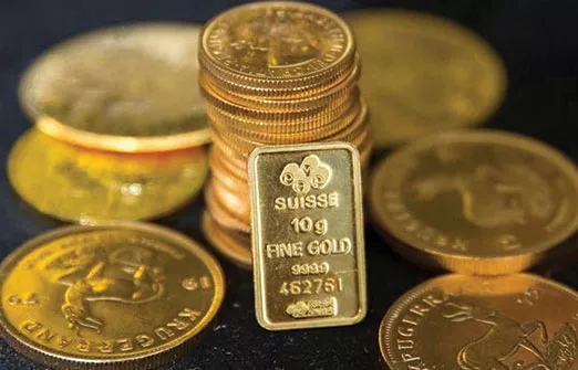 Золото упало почти до двухлетнего минимума из-за повышения ставки ФРС